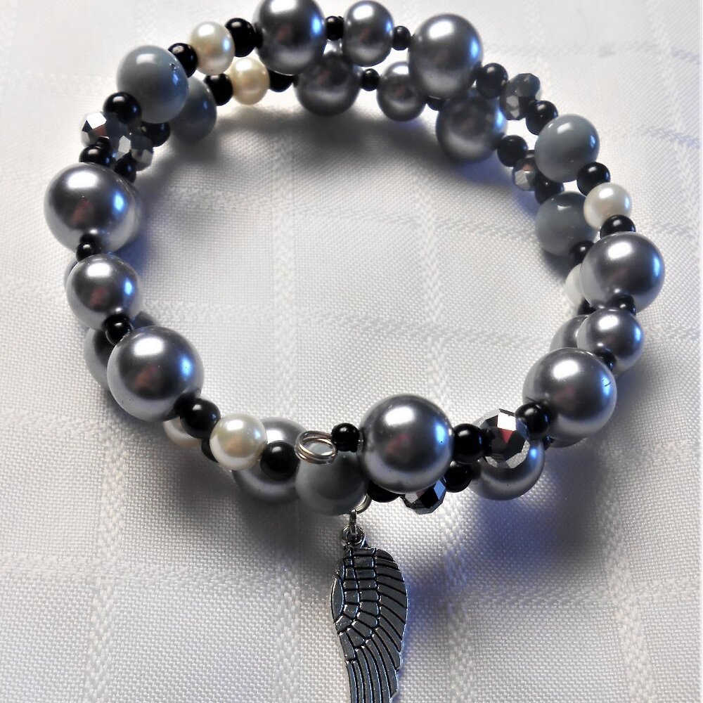 Handmade jewelry set with memory wire bracelets and asymetrical earrings